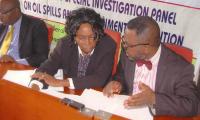 The picture shows two persons at the sitting of the special investigation panel of oil spills and environmental polution by NHRC